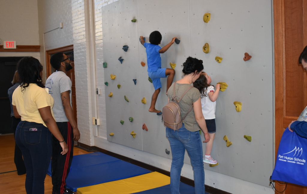 kids on rock climbing wall